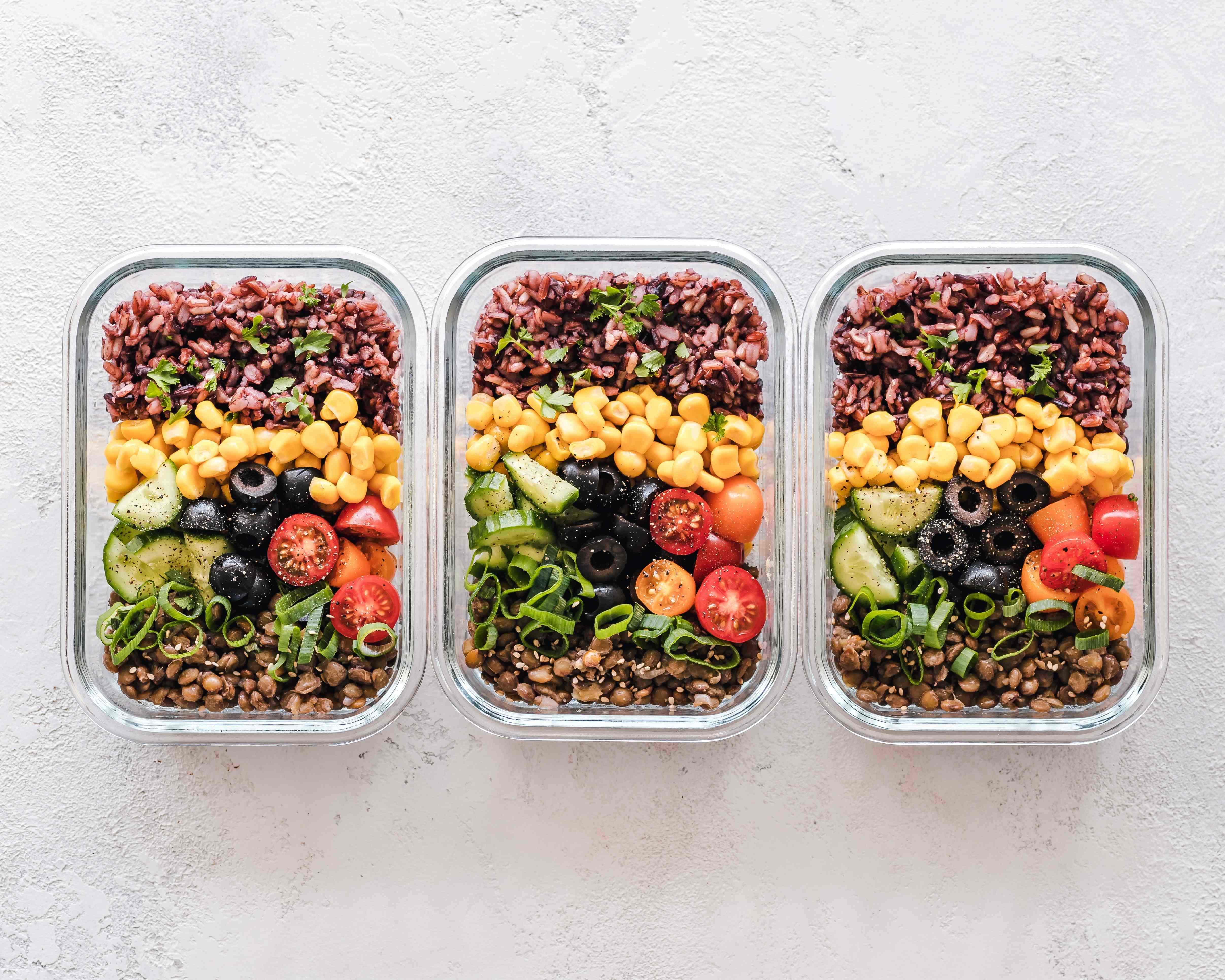 Meals portioned out evenly into separate containers